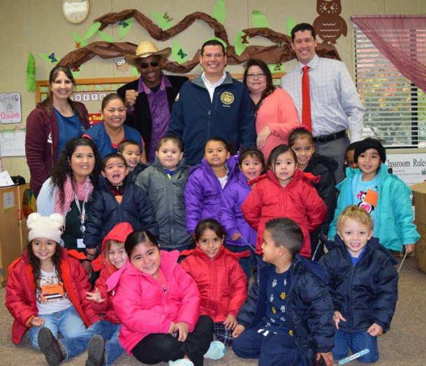 Lemoore City Councilmember Eddie Neal helped Assemblymember Rudy Salas distribute coats in Lemoore this past week.